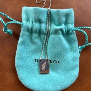 Original Tiffany & Co. Sterling silver Nike SF half marathon necklace.